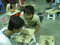 Rice painting for the benefit of people with disabilities in Vietnam